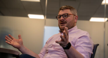 Man speaking in meeting room
