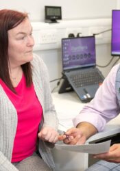 Dr Amir Afzul and a patient