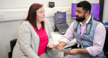 Dr Amir Afzul and a patient
