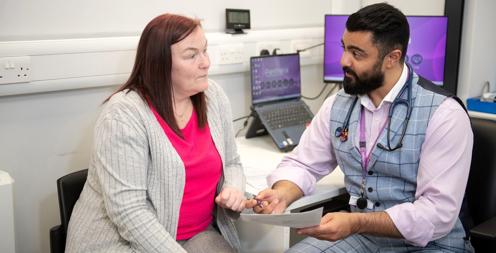 Dr Amir Afzul and a patient