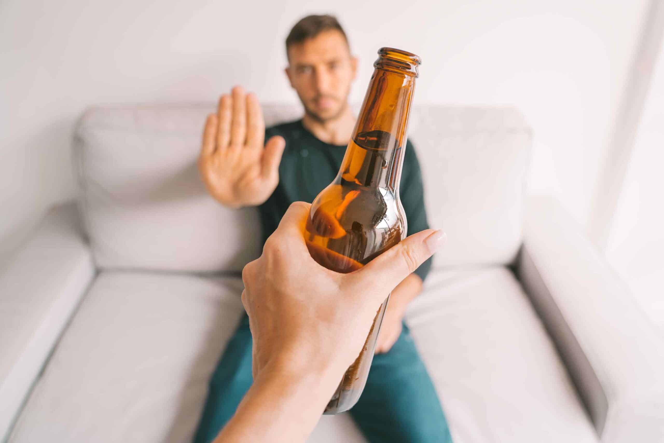 alcohol clinical trial - gentleman saying no to a drink