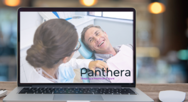 Laptop with doctor and patient showcased on screen